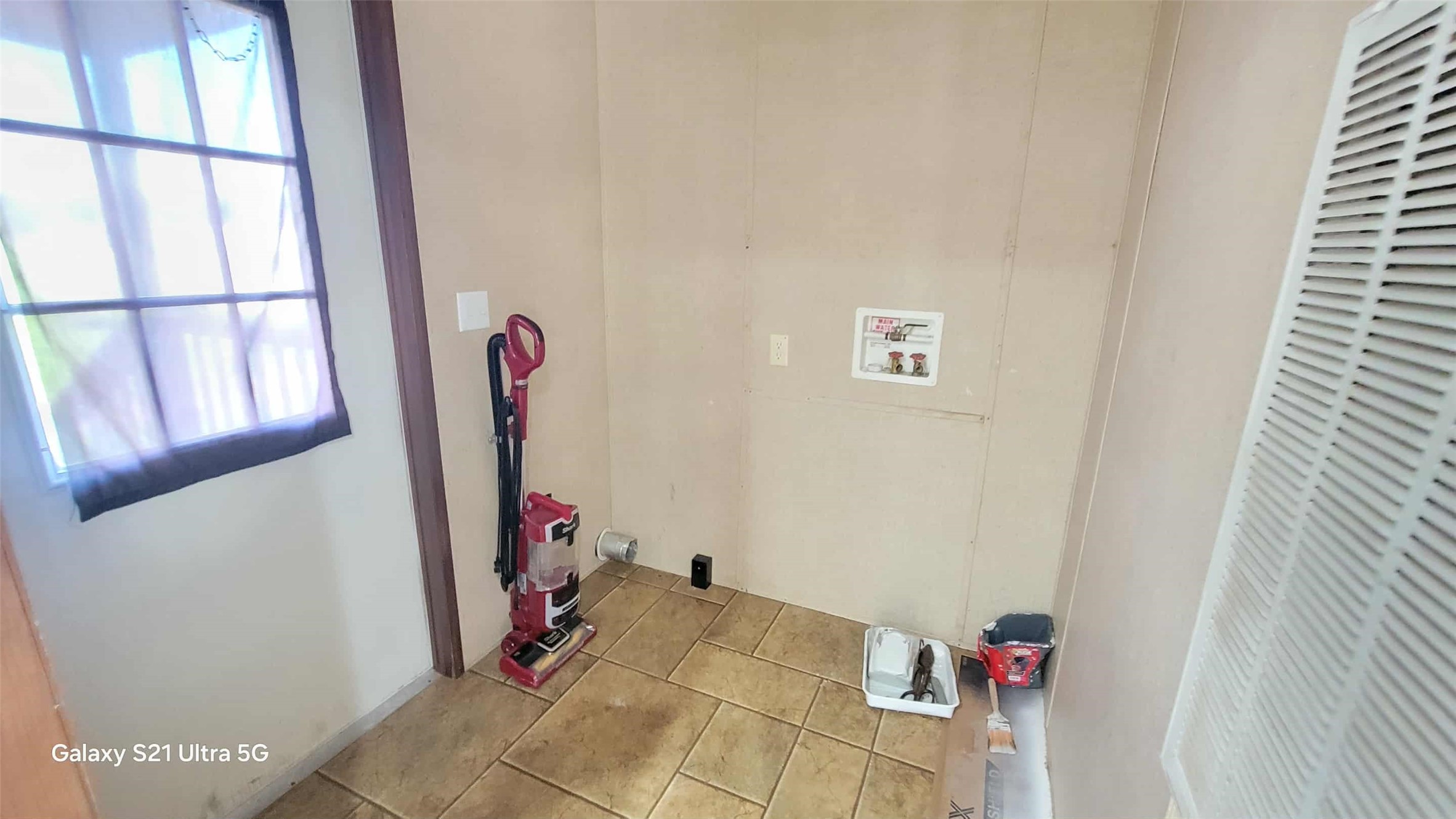 405 Battlebell Road, Unit 2 Highlands, TX 77562 - Photo 16 of 21 a view of storage and utility room