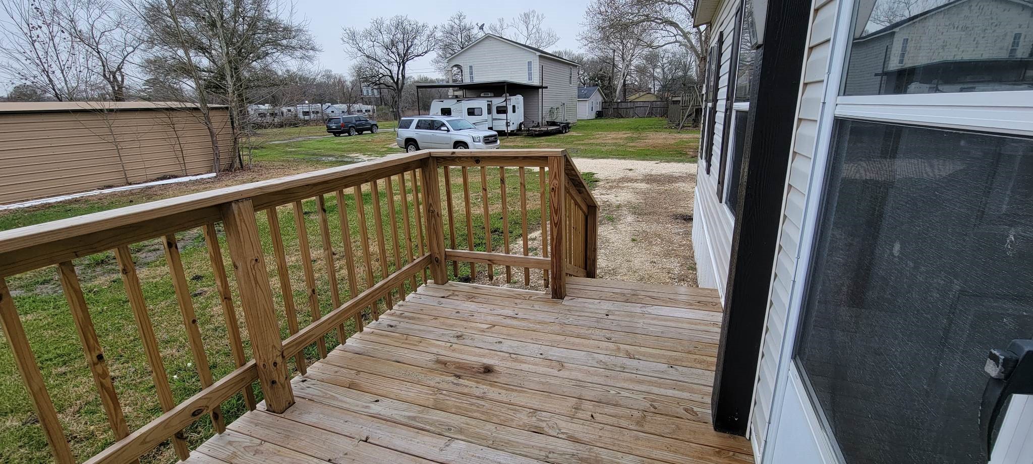 405 Battlebell Road, Unit 2 Highlands, TX 77562 - Photo 17 of 21 a view of deck with patio