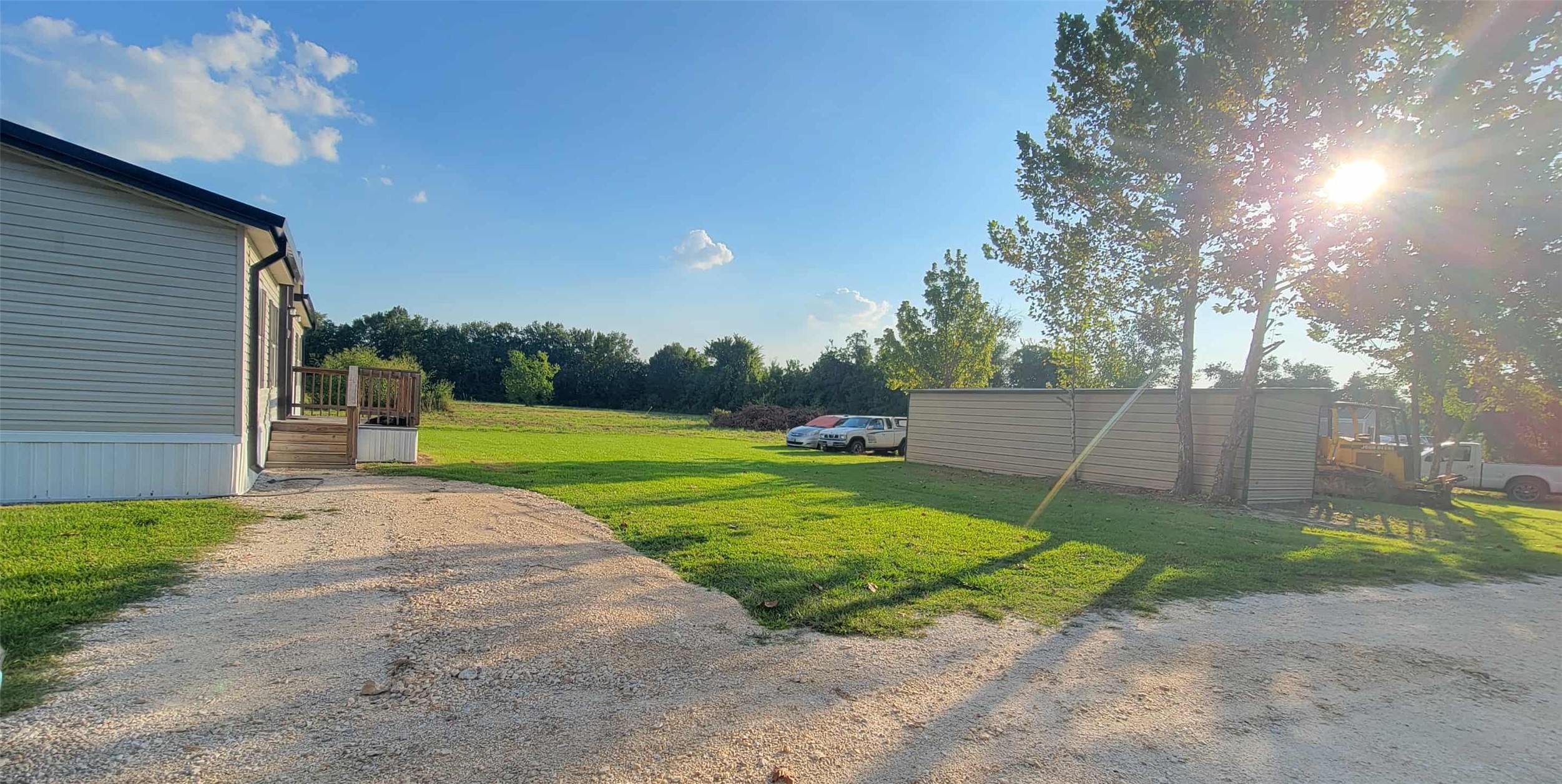 405 Battlebell Road, Unit 2 Highlands, TX 77562 - Photo 18 of 21 a view of a backyard with green space