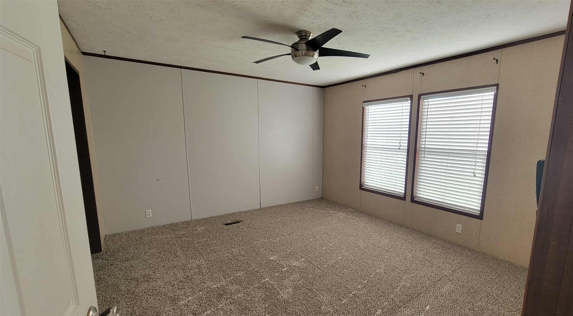 405 Battlebell Road, Unit 2 Highlands, TX 77562 - Photo 10 of 21 a view of a livingroom with a ceiling fan and window