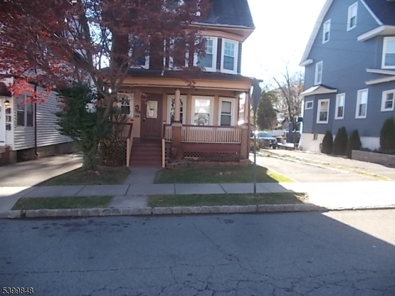 104 Riggs Place West Orange, NJ 07052 - Photo 2 of 23 a front view of a house with a yard