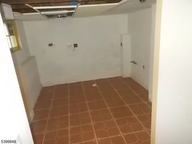 a bathroom with a glass door shower