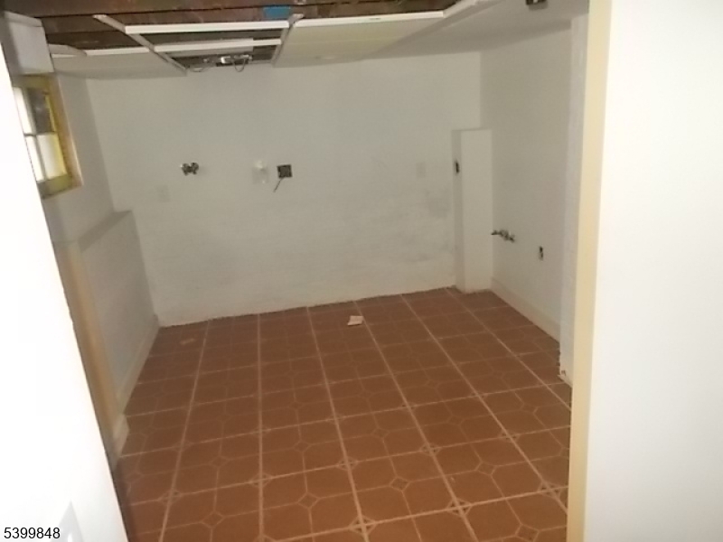 104 Riggs Place West Orange, NJ 07052 - Photo 23 of 23 a bathroom with a glass door shower