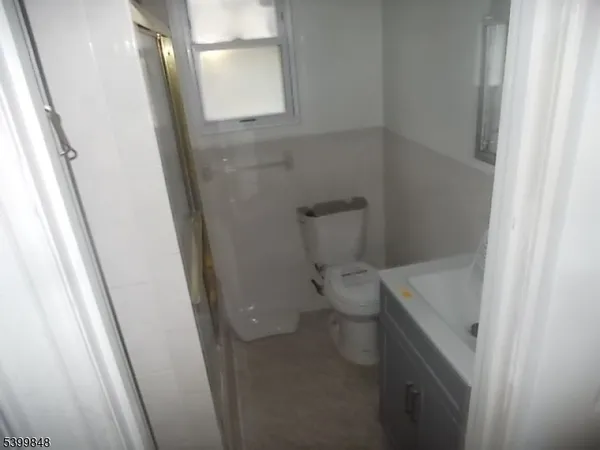a bathroom with a sink and toilet