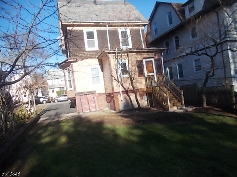 104 Riggs Place West Orange, NJ 07052 - Photo 6 of 23 a view of back yard of the house