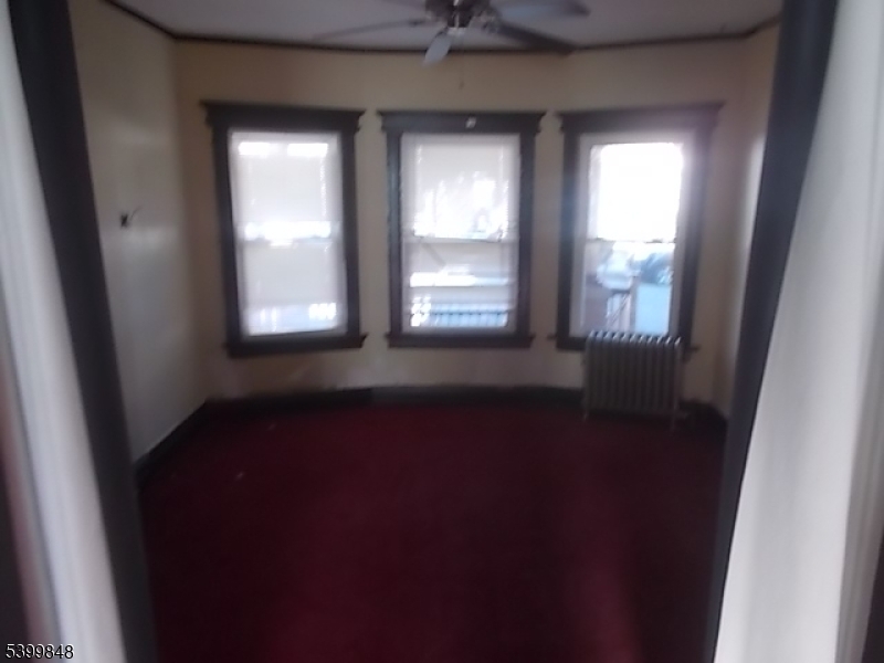 104 Riggs Place West Orange, NJ 07052 - Photo 7 of 23 an empty room with windows