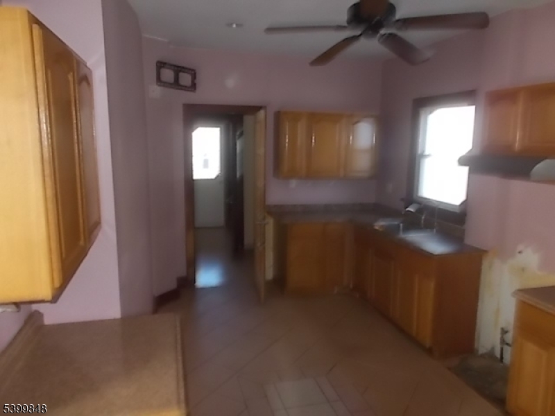 104 Riggs Place West Orange, NJ 07052 - Photo 10 of 23 a view of a hallway with windows