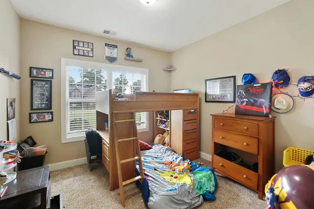 a view of a house with backyard porch and garden