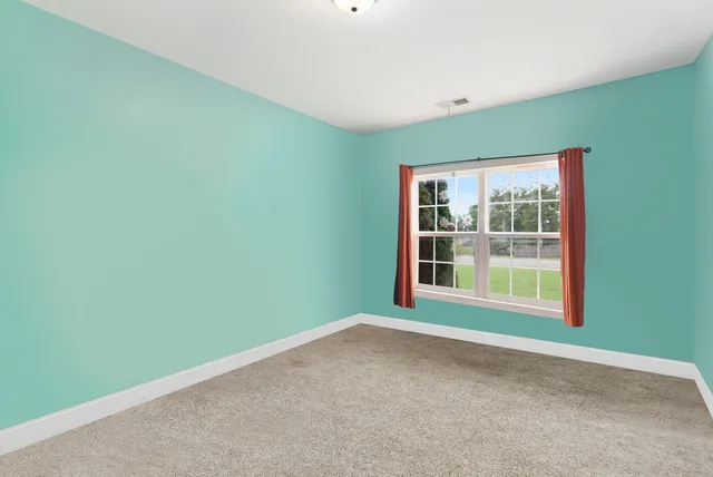 a house with yard and a garden