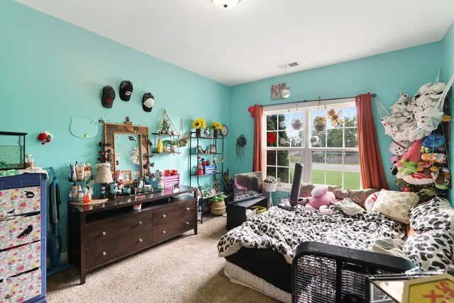 an aerial view of a house with a garden