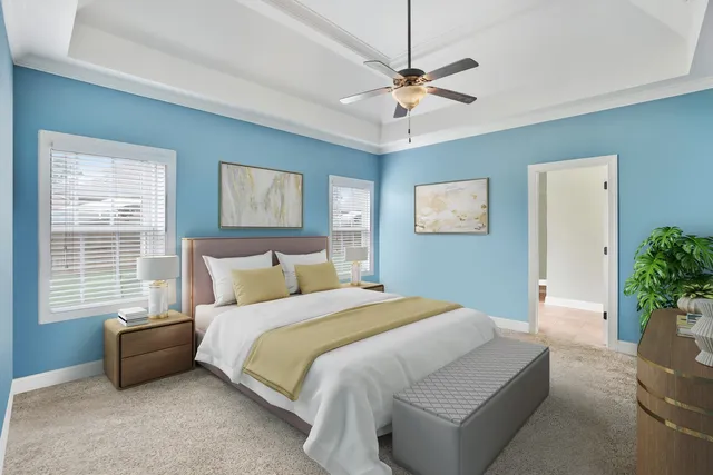 a bedroom with a bed a couch and a window