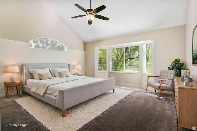 1417 Blacksmith Lane Draper, UT 84020 - Photo 21 of 57 Vaulted ceiling bedroom with a ceiling fan, a prominent bay window, and an arched transom window