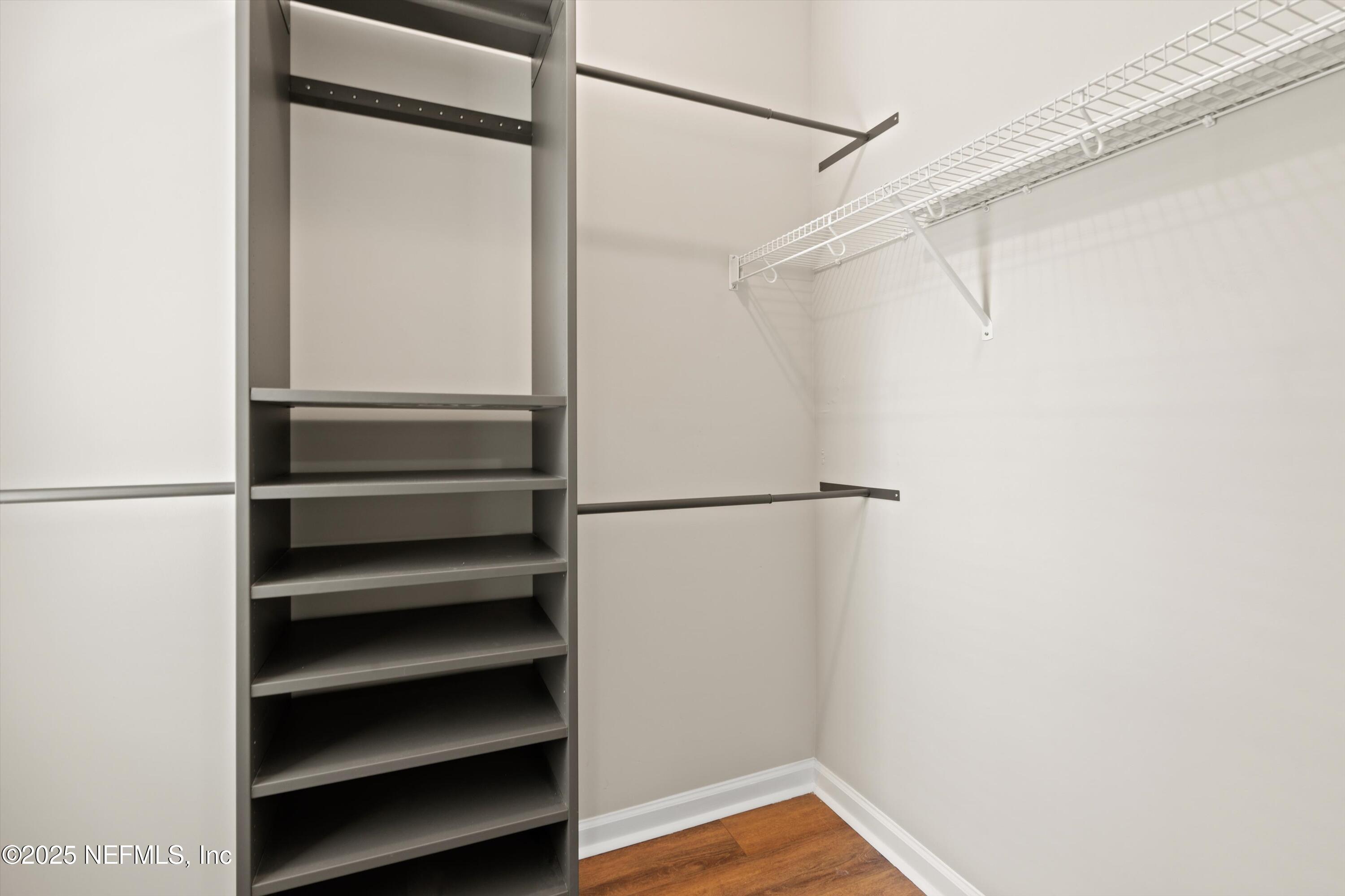 13340 Ocean Mist Drive Jacksonville, FL 32258 - Photo 14 of 25 a view of walk in closet with empty racks