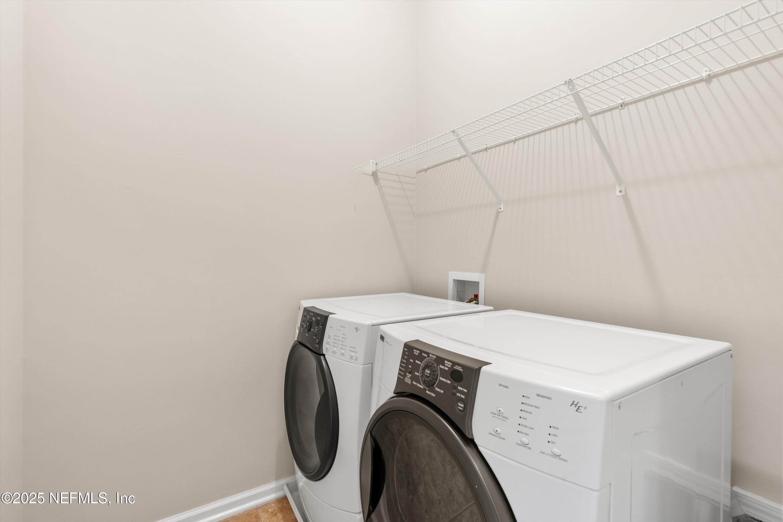 13340 Ocean Mist Drive Jacksonville, FL 32258 - Photo 16 of 25 a utility room with dryer and washer