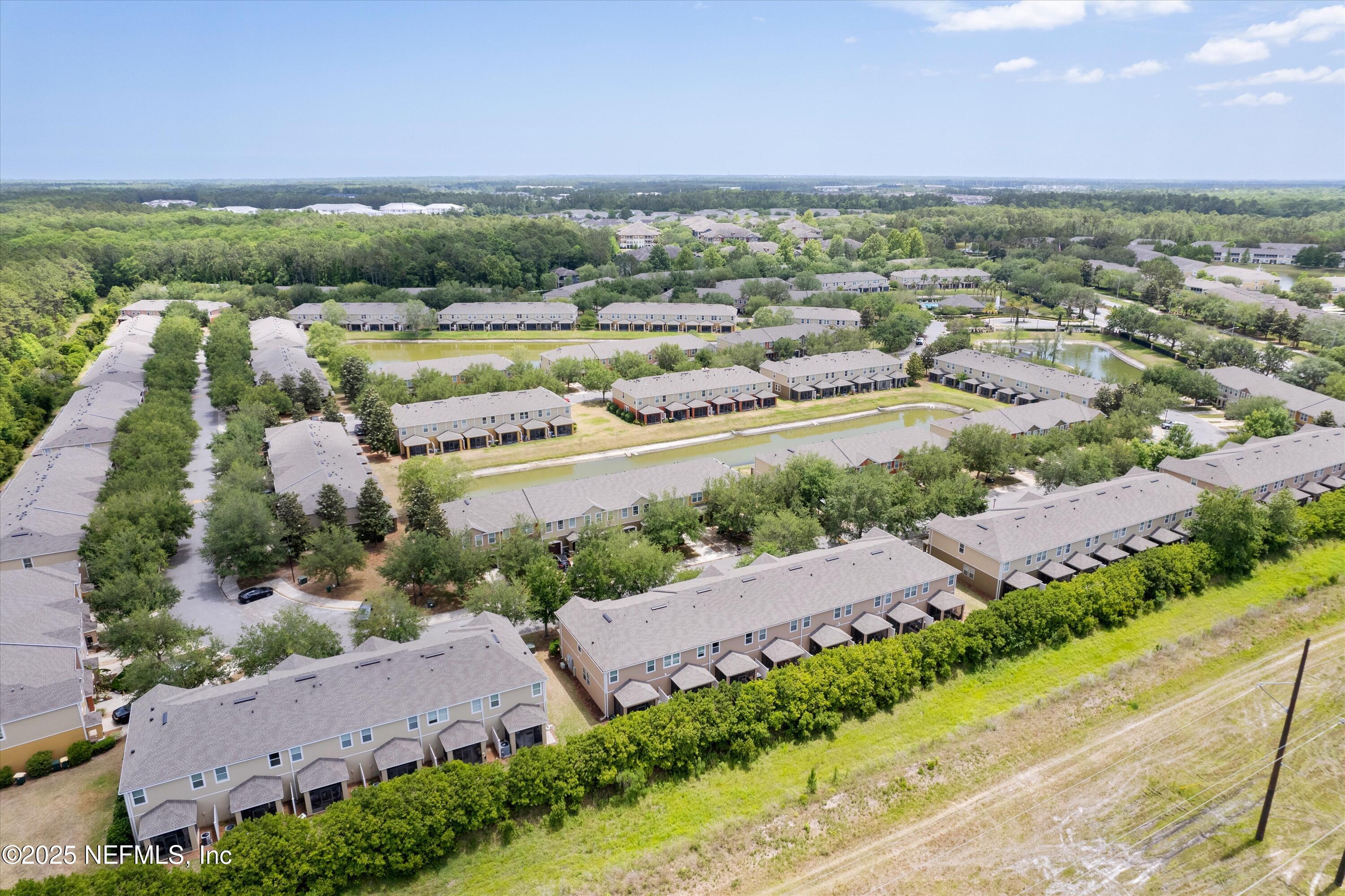 13340 Ocean Mist Drive Jacksonville, FL 32258 - Photo 25 of 25 an aerial view of a city with lots of residential buildings