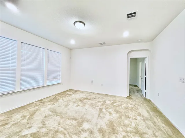 an empty room with a natural light