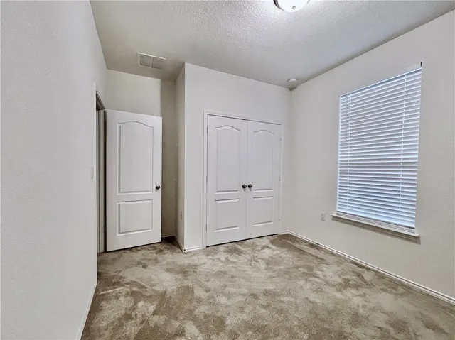 a bathroom with a tub a sink and a shower