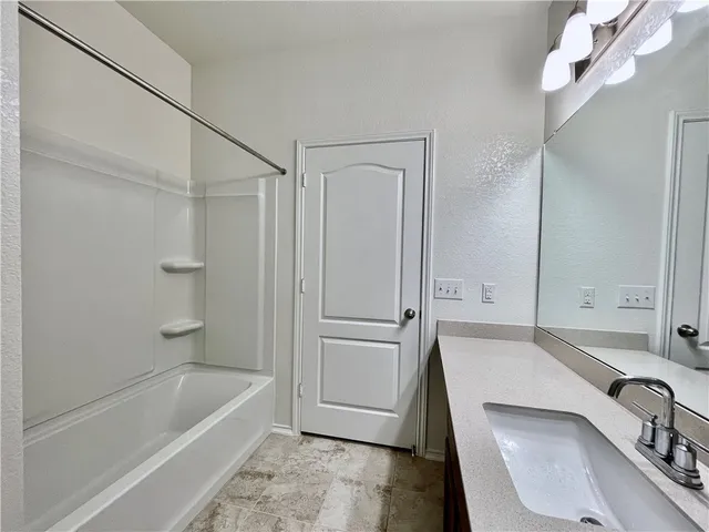 a view of a terrace with a yard