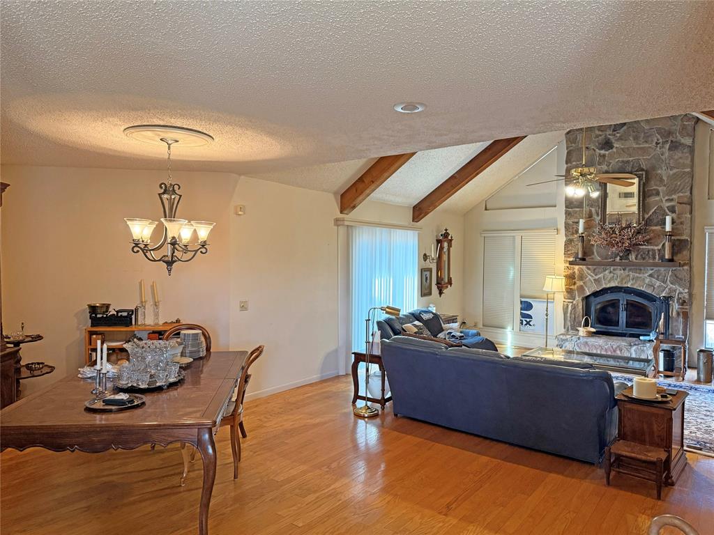 5393 Highway 5 Van Alstyne, TX 75495 - Photo 16 of 40 a living room with furniture and a fireplace