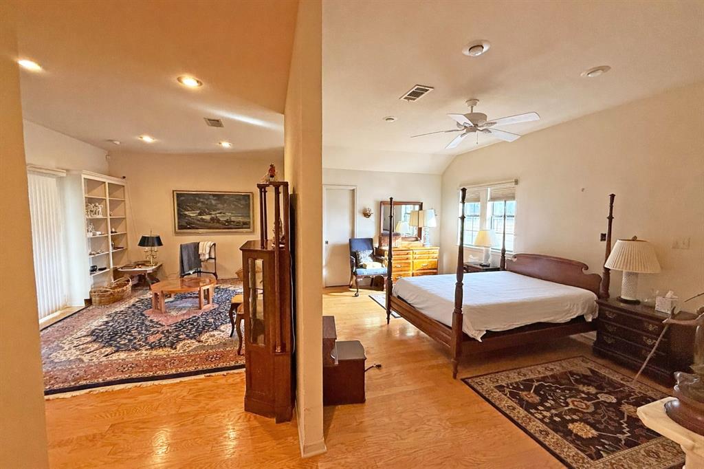 5393 Highway 5 Van Alstyne, TX 75495 - Photo 24 of 40 a very nice looking room with a bed and glass door