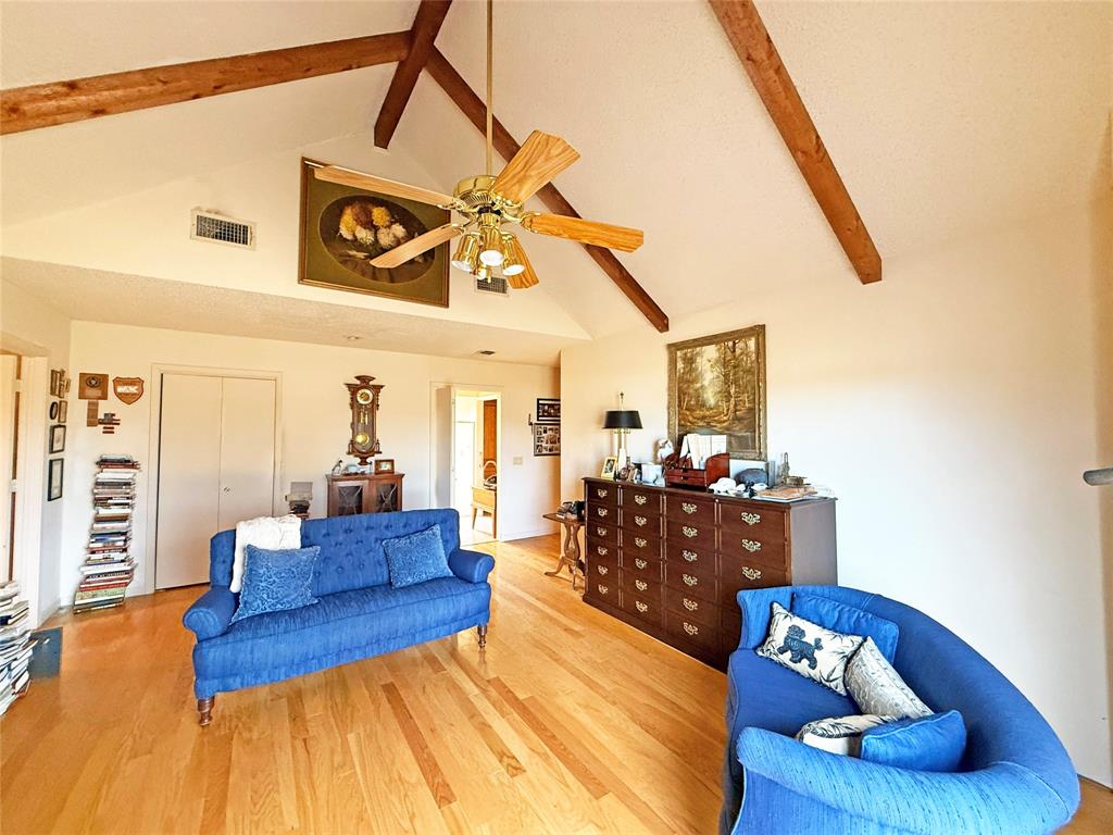 5393 Highway 5 Van Alstyne, TX 75495 - Photo 28 of 40 a living room with furniture and wooden floor