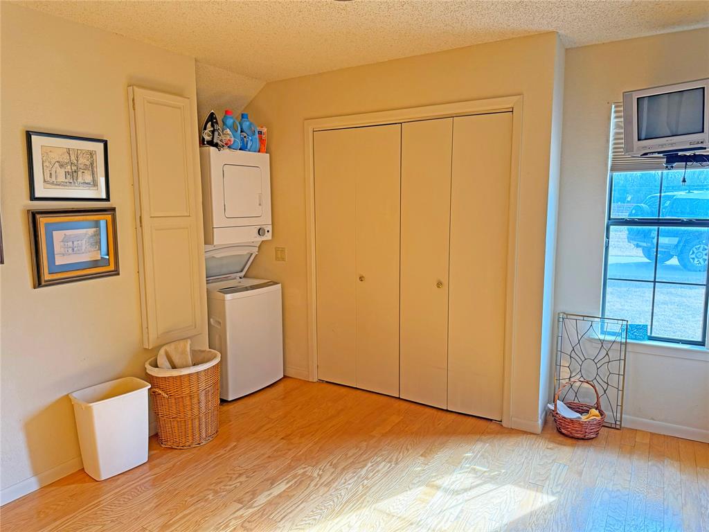 5393 Highway 5 Van Alstyne, TX 75495 - Photo 32 of 40 a view of a room with wooden floor and cabinet
