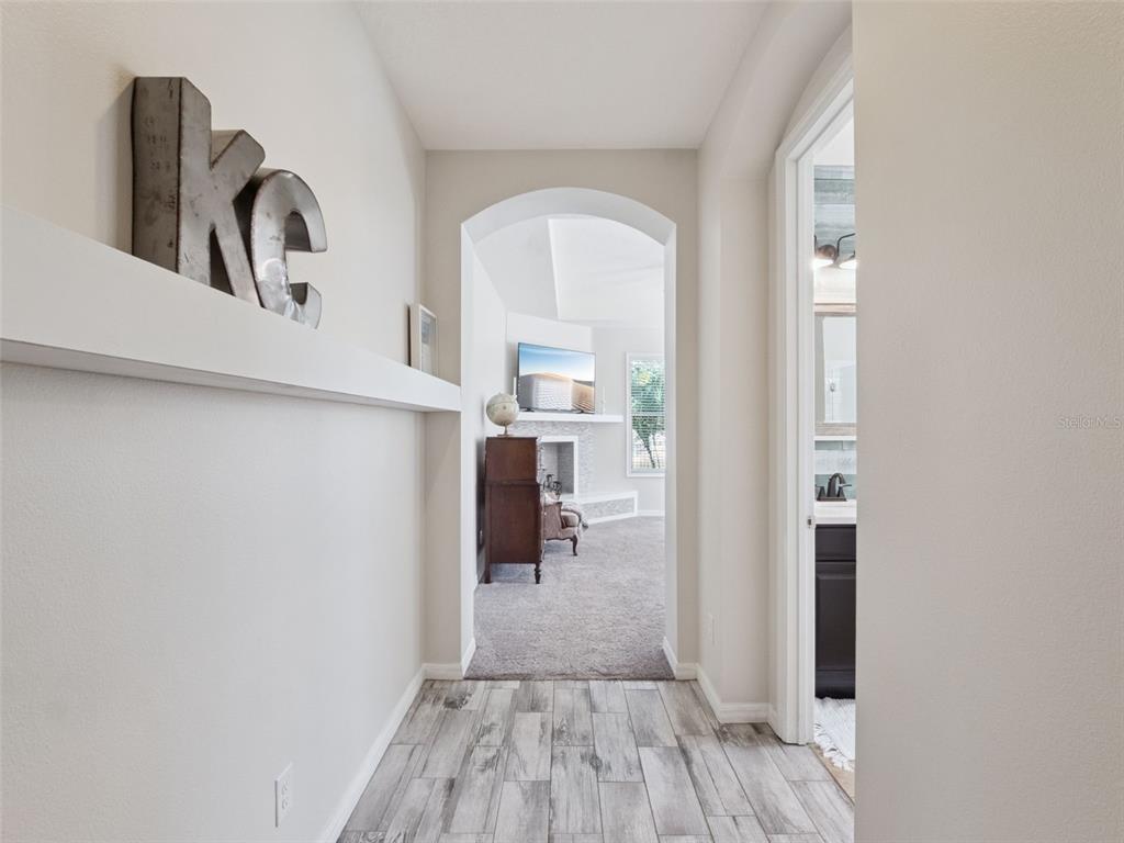 1025 Sadie Ridge Road Clermont, FL 34715 - Photo 20 of 50 a view of livingroom with furniture and wooden floor