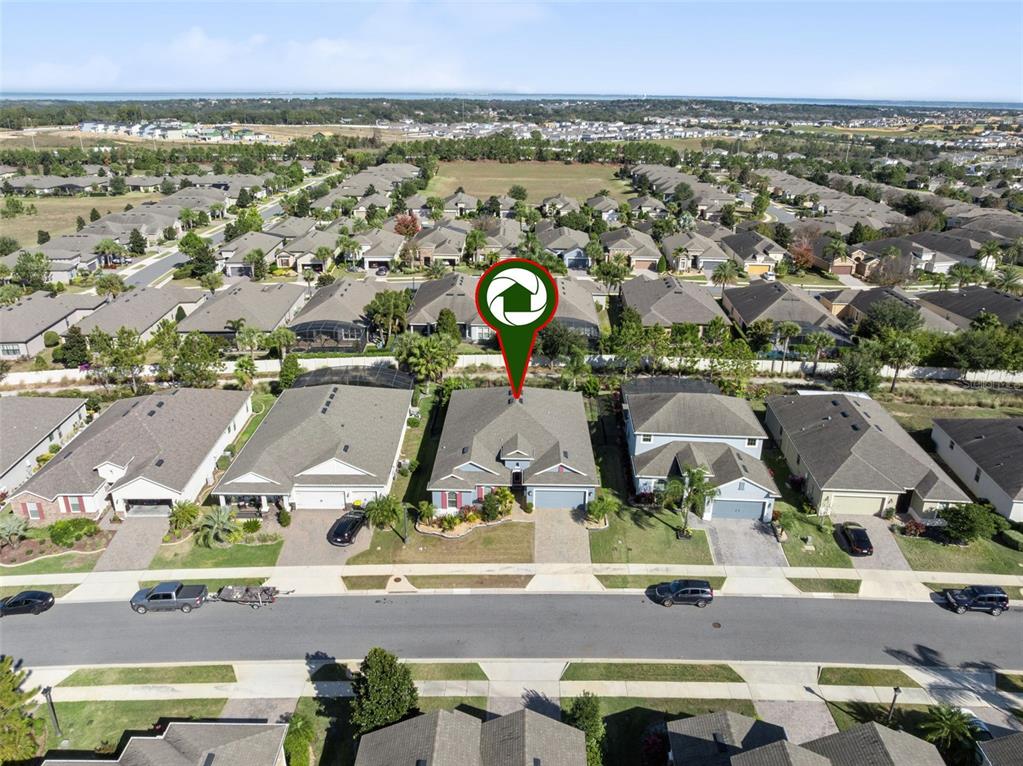 1025 Sadie Ridge Road Clermont, FL 34715 - Photo 33 of 50 an aerial view of residential houses with outdoor space