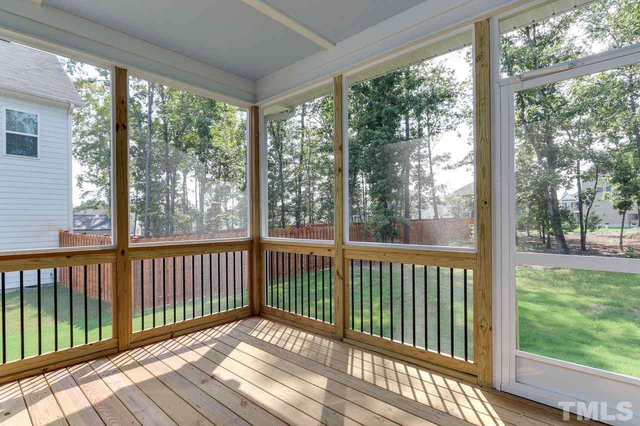 504 Cristobal Street, Unit 134 Rolesville, NC 27571 - Photo 29 of 30 a view of a wooden deck