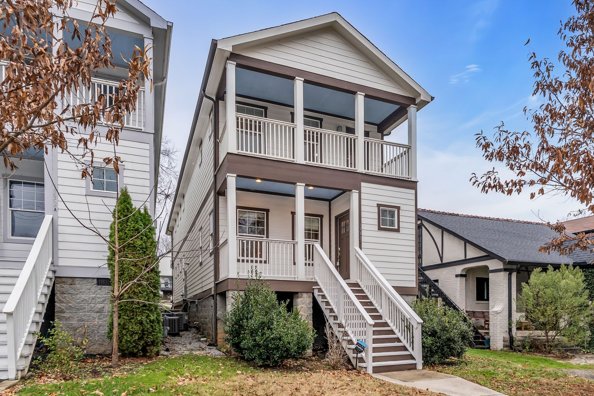 front view of a house with a yard