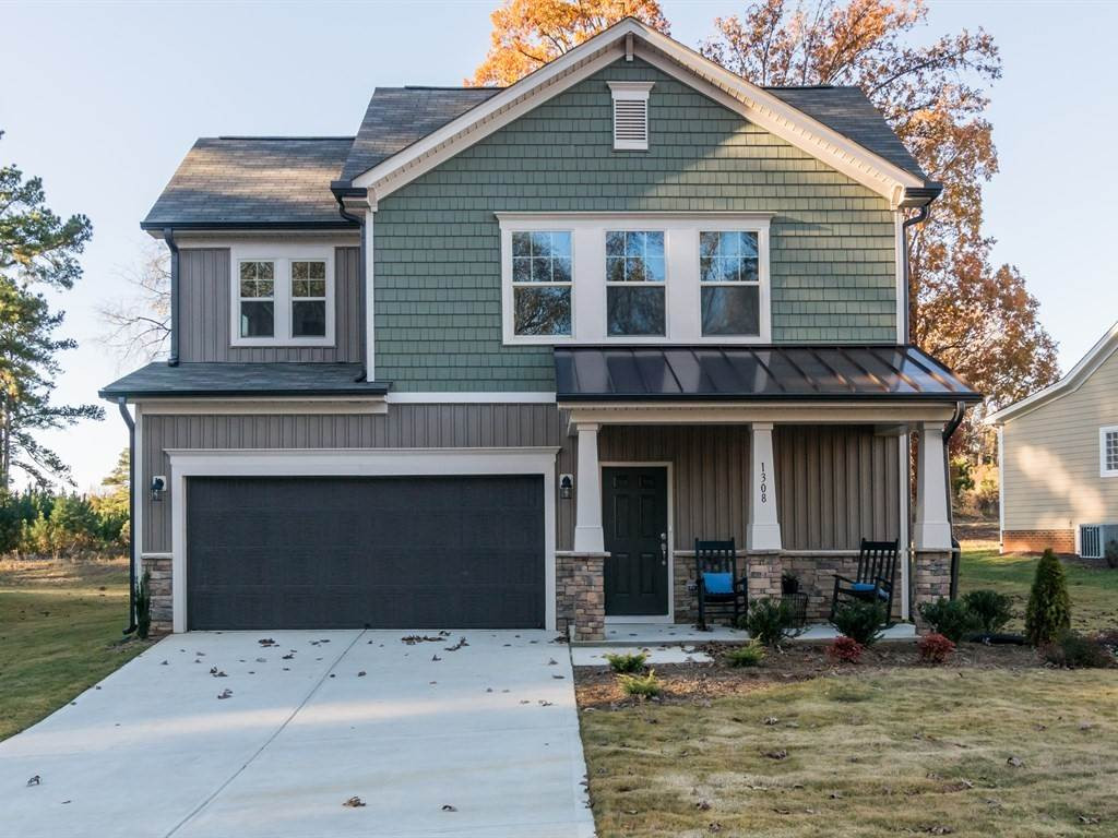17 Rattan Bay Court Durham, NC 27713 - Photo 1 of 17 Please note this is the exterior of the model home- actual home has a different color scheme Model Exterior