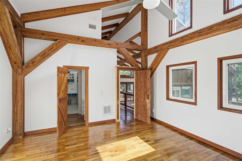 3490 Southeast 193rd Place Yankeetown, FL 34498 - Photo 23 of 71 a view of an entryway with wooden floor and door
