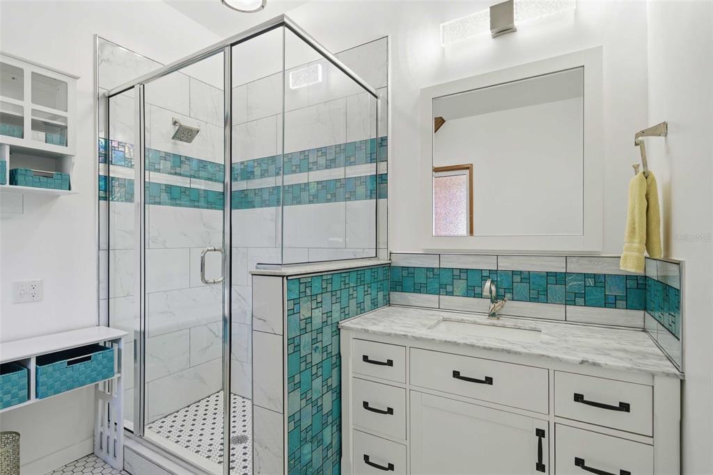 3490 Southeast 193rd Place Yankeetown, FL 34498 - Photo 27 of 71 a bathroom with a sink and a mirror