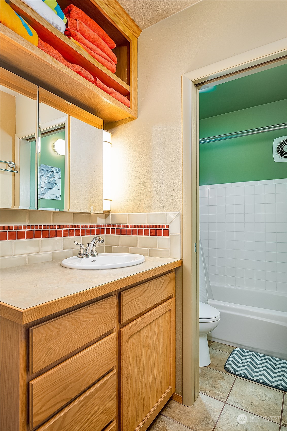 17800 Alpental Access Road, Unit 1114 Snoqualmie Pass, WA 98068 - Photo 12 of 21 a bathroom with a sink a toilet and a bathtub