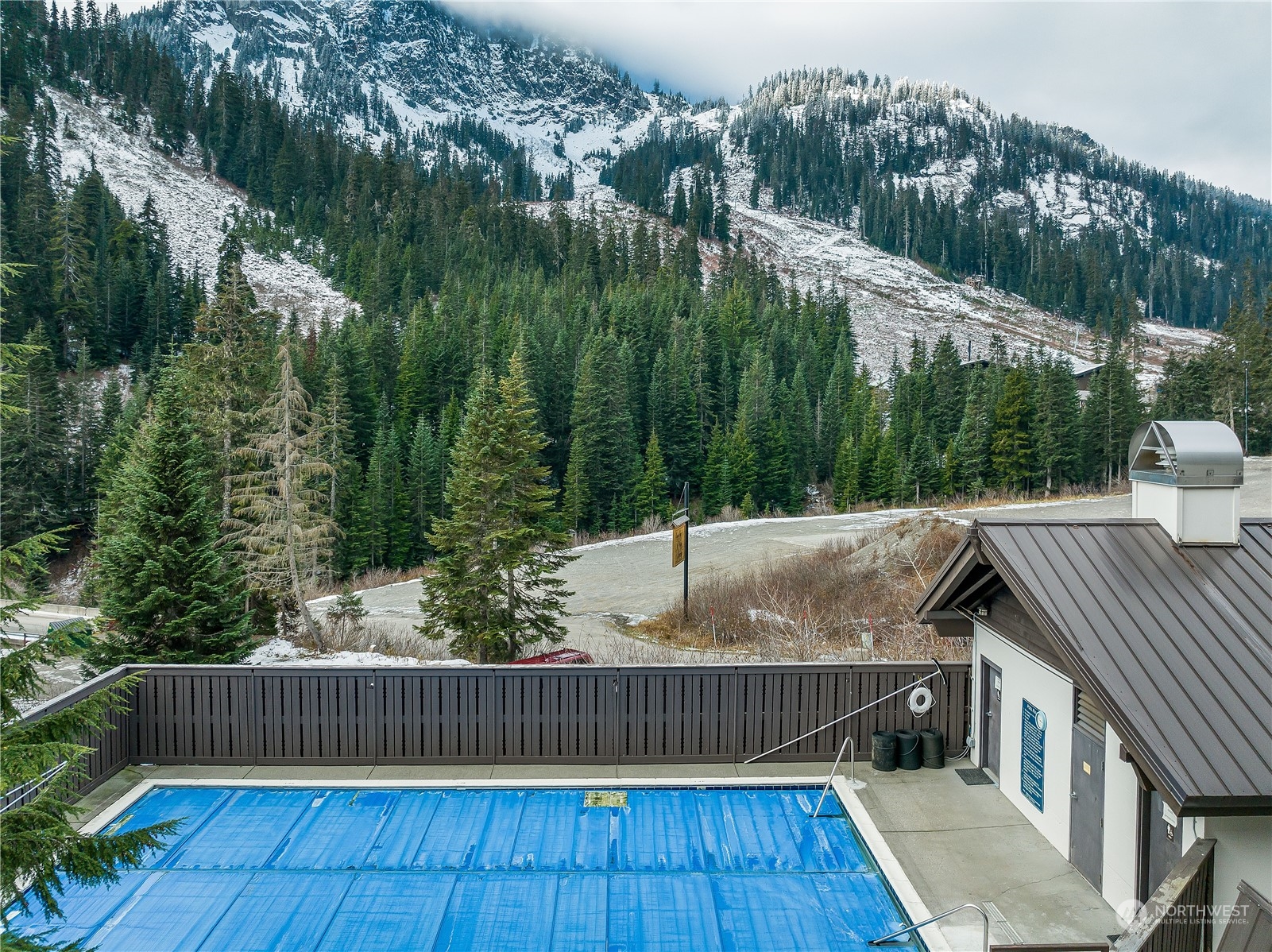 17800 Alpental Access Road, Unit 1114 Snoqualmie Pass, WA 98068 - Photo 14 of 21 a view of outdoor space and yard with swimming pool