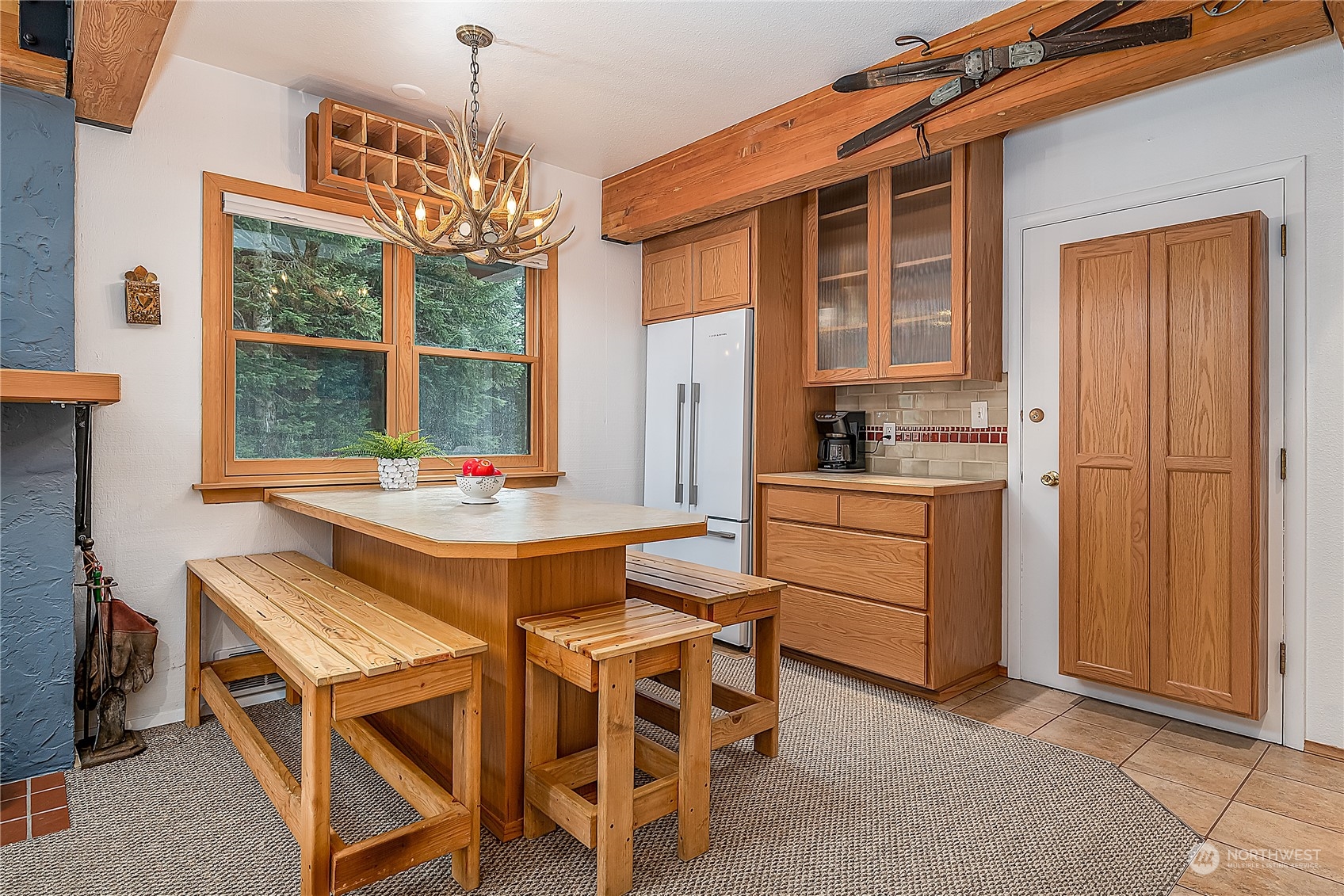 17800 Alpental Access Road, Unit 1114 Snoqualmie Pass, WA 98068 - Photo 9 of 21 a dining room with furniture and window