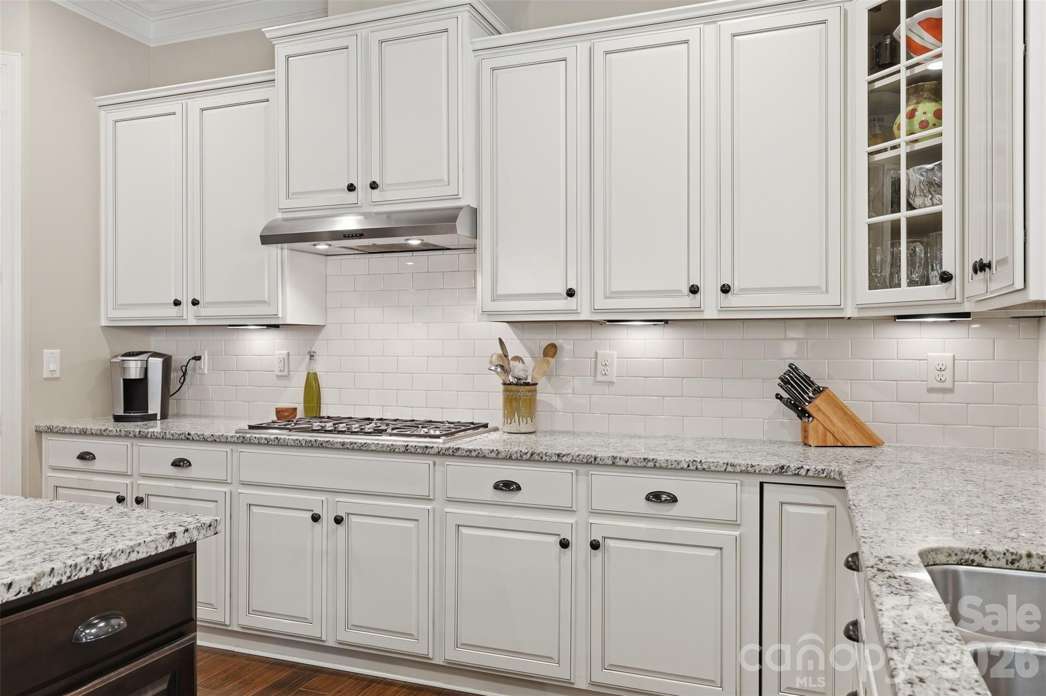 8094 Clems Branch Road Indian Land, SC 29707 - Photo 14 of 38 a kitchen with stainless steel appliances granite countertop white cabinets and a sink