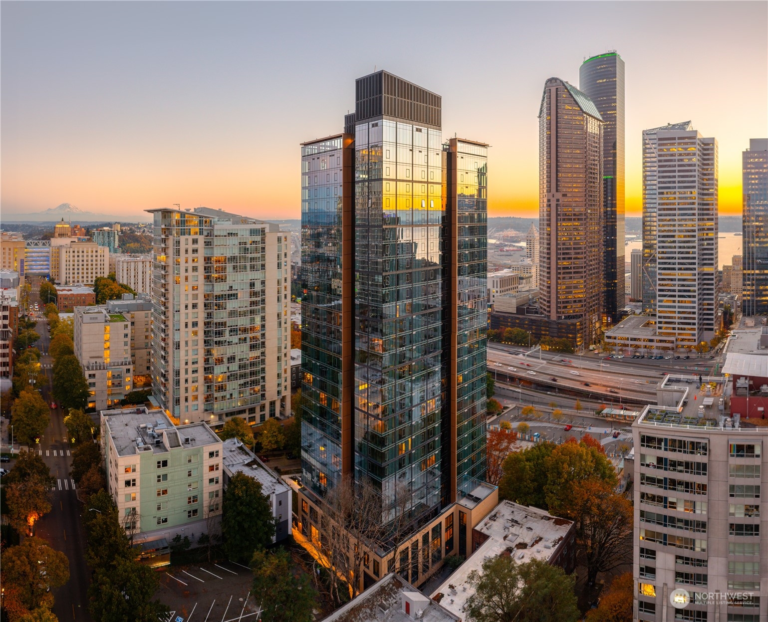 a view of city with tall buildings