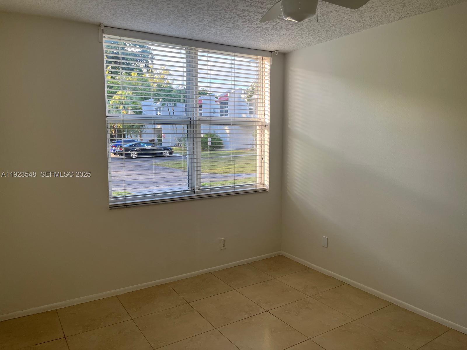9421 Evergreen Place, Unit 107 Davie, FL 33324 - Photo 15 of 49 a view of a room that has a window in it
