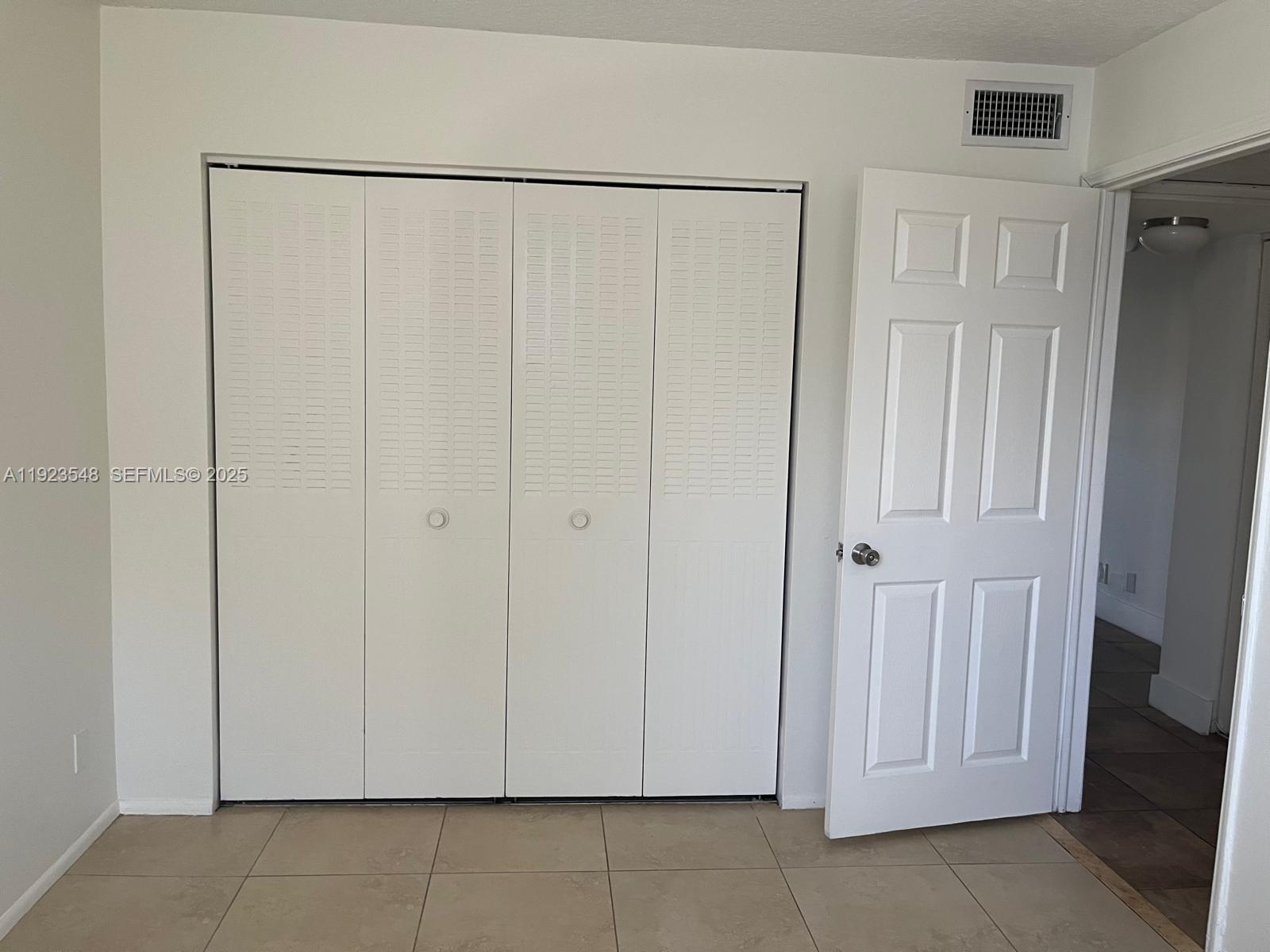 9421 Evergreen Place, Unit 107 Davie, FL 33324 - Photo 16 of 49 a view of a closet area