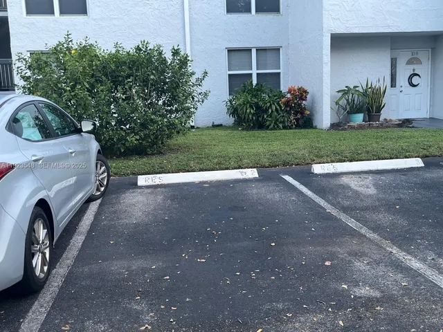 a view of outdoor space with deck and trees