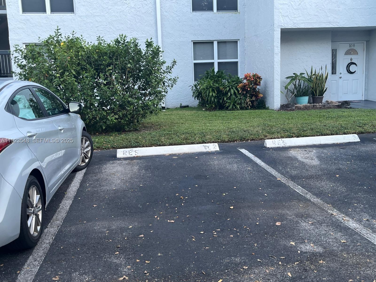 9421 Evergreen Place, Unit 107 Davie, FL 33324 - Photo 37 of 49 a view of outdoor space and yard