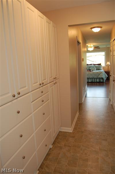 7840 Ferguson Road Kent, OH 44240 - Photo 16 of 25 Plenty of built in cabinets and hall in between Master #1 & Master #2.