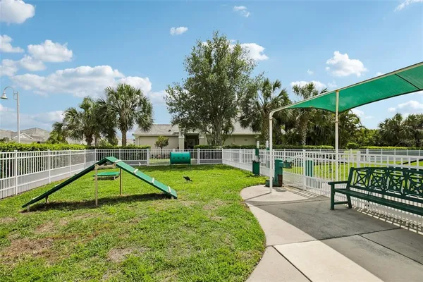 a view of a park with swings