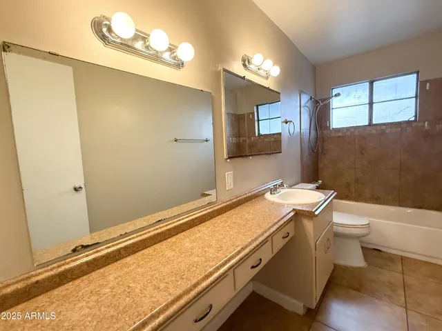 a room with a table and chairs