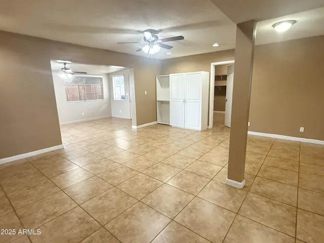 a view of a bathroom with a sink and a mirror