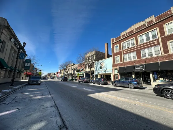 a view of a street with cars