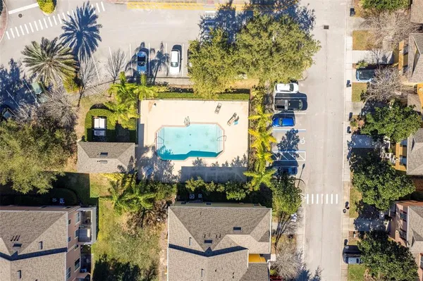 an aerial view of a house with swimming pool