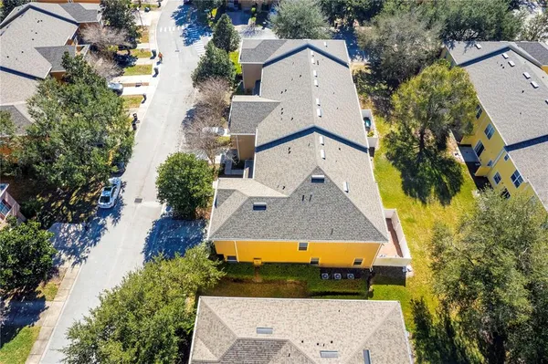 an aerial view of residential house with an outdoor space