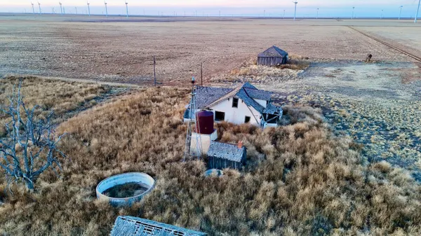 a view of a terrace with sitting area